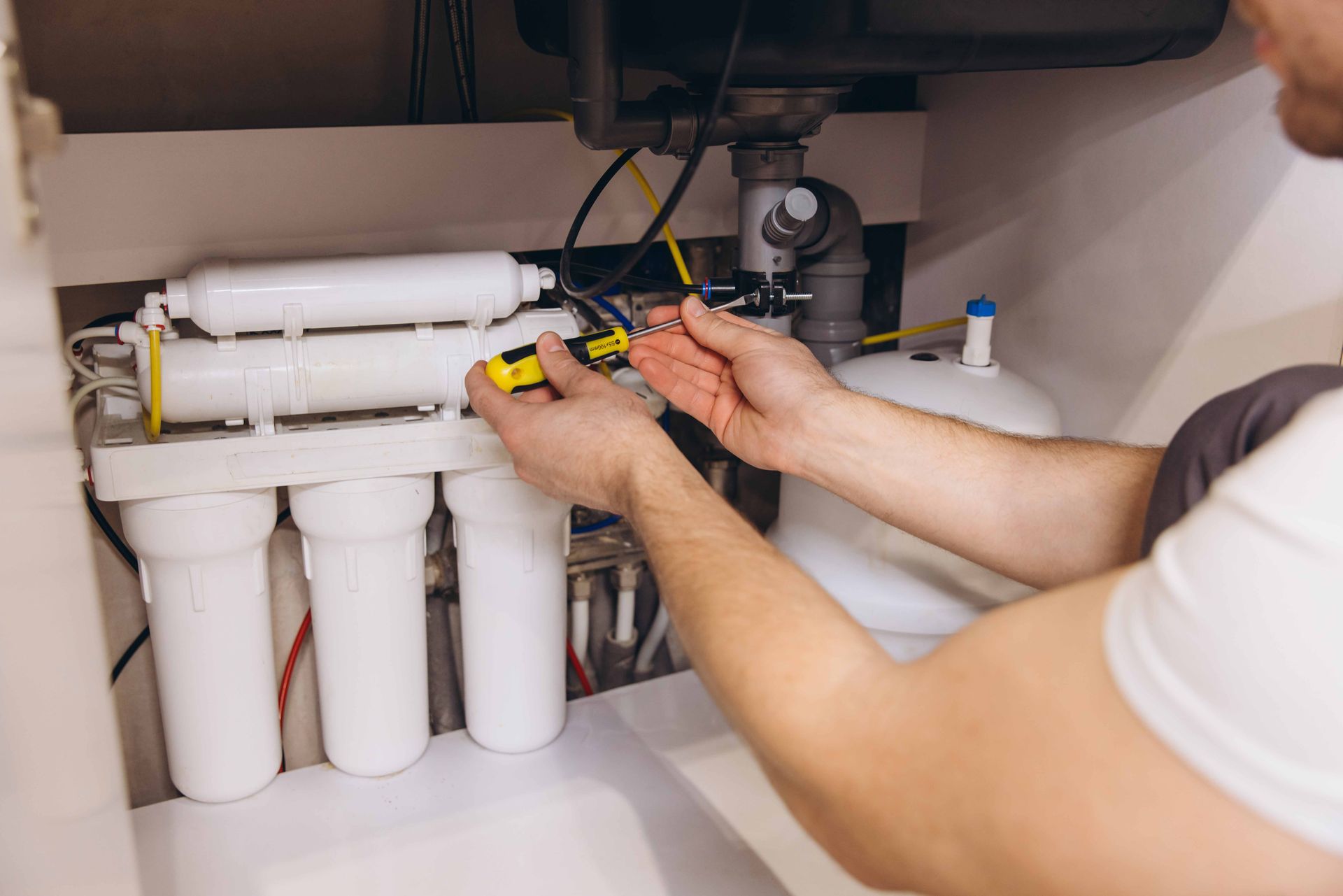 A water filtration system being serviced